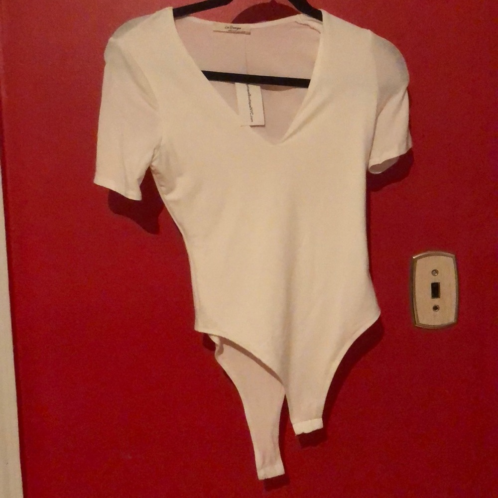 white v-neck bodysuit